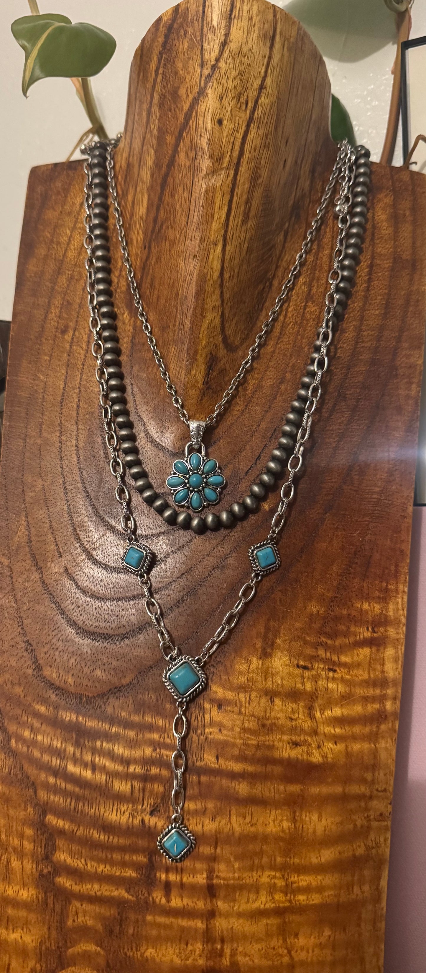 The tres necklace stack